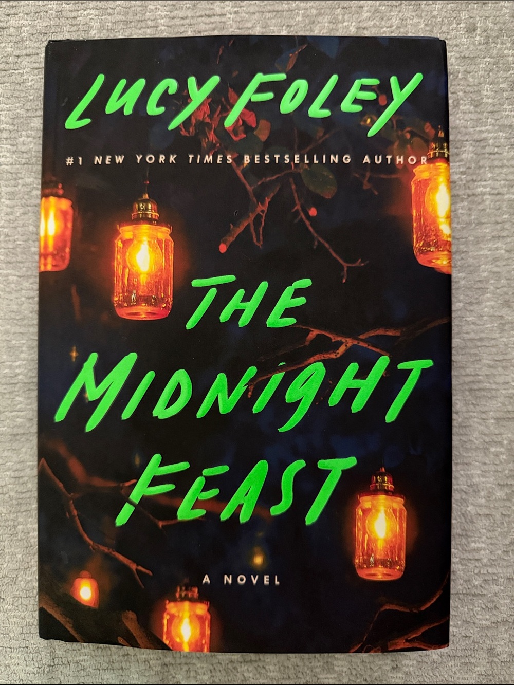 Lucy Foley "The Midnight Feast" Hardcover - Black with Neon Green Text